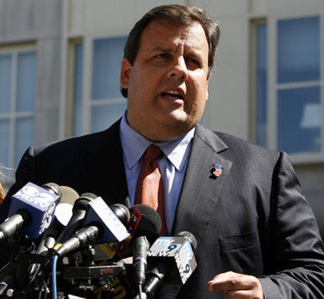 Christie speaking to reporters in Hoboken, New Jersey, in July 2007