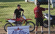 Carr (left) during his 2011 farewell tour Chris Carr 2011 Angell Park Speedway.jpg