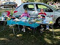 * Nomination: Traders of a flea market in Job in a en:Second-hand shop in en:Job, Puy-de-Dôme. --Touam 20:20, 26 September 2022 (UTC) * Review  Comment I don't like the compo. Too much casual for me. The table is bad cropped at left, and there is a big space at right. The picture is sharp ok. There is harsh light in the background. --Sebring12Hrs 11:48, 30 September 2022 (UTC)