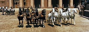 American film Ben-Hur by William Wyler (1959) was shot at the Cinecitta studios and on location around Rome during the "Hollywood on the Tiber" era. Cuadrigas de Ben Hur (1959).jpg
