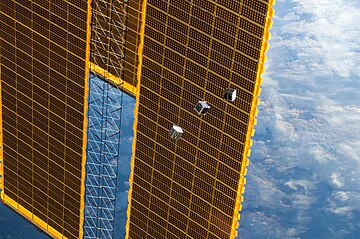 CubeSats deployed to orbit from the International Space Station on 4 October 2012 (from left: TechEdSat-1, F-1 and FITSAT-1). CubeSats launched by ISS Expedition 33.jpg