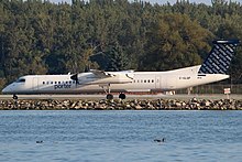 A De Havilland Canada Dash 8 Q400 at Billy Bishop Toronto City Airport De Havilland Canada DHC-8-402Q Porter Airlines C-GLQP, YTZ Toronto, ON (Toronto Island Airport), Canada PP1378673003.jpg