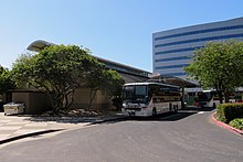 Thruway buses at Emeryville station Emeryville station building and Thruway buses, June 2018.JPG