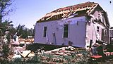 E/F1 damage: Cause major damage to mobile homes and automobiles, and can cause minor structural damage to well-constructed homes. This unanchored wood-frame home sustained major roof damage, and was pushed from its foundation while remaining intact. Around 35% of all annual tornadoes in the U.S. are E/F1 tornadoes.