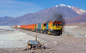 FCAB EMD GR12 and two Clyde GL26C-2 crossing Salar de Ascotan, Chile.jpg