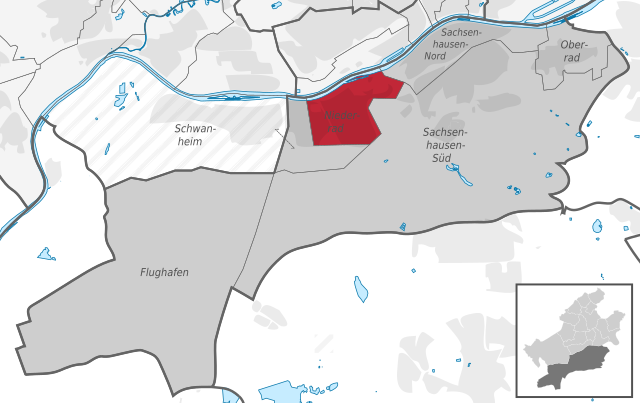 Carte situant le quartier (en rouge) au sein l'arrondissement (en gris foncé) et du reste de la ville (en gris clair)