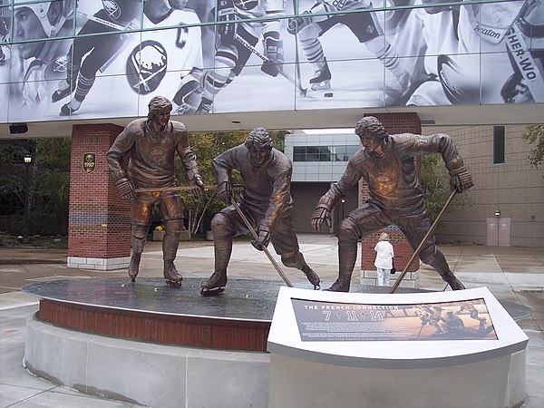 A statue of the French Connection line stands outside KeyBank Center. Consisting of Gilbert Perreault, Rick Martin, and Rene Robert, they played toget