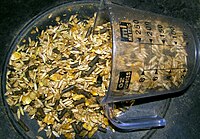 A premixed ration of crimped corn, oats, barley and pelleted supplement GrainMix.jpg