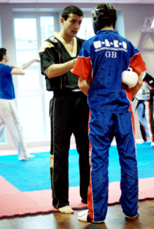 Gregorio Di Leo at public kickboxing event.png