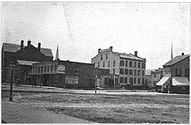 Commercial buildings on the SW corner of Griswold and Lafayette, photographed in 1873.
