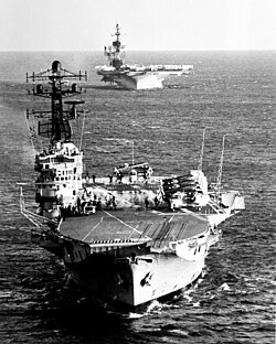 HMAS Melbourne (R21) and USS Midway (CV-41) underway on 16 May 1981 (6380752).jpg