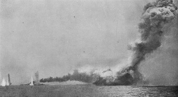 Two-photo composite of Lion (left) surrounded by waterspouts from enemy gunfire and right Queen Mary exploding