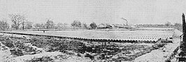 Hoskins' pipe factory, Midland Junction, WA, with 60 miles of pipes for Coolgardie Water Supply Scheme in foreground. Hoskins' pipe works, Midland Junction, WA, with 60 miles of pipes for Coolgardie Water Supply (Daily Telegraph (Sydney), 12 May 1914, p11 ).jpg