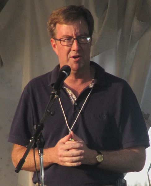 MPP Jim Watson speaking at the 2009 Ottawa Folk Festival