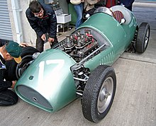 2.5L FPE Godiva with Weber Carburetors finally installed in the original 1954 Kieft chassis after being separated for 48 years. Kieft GP car Donington pits.jpg