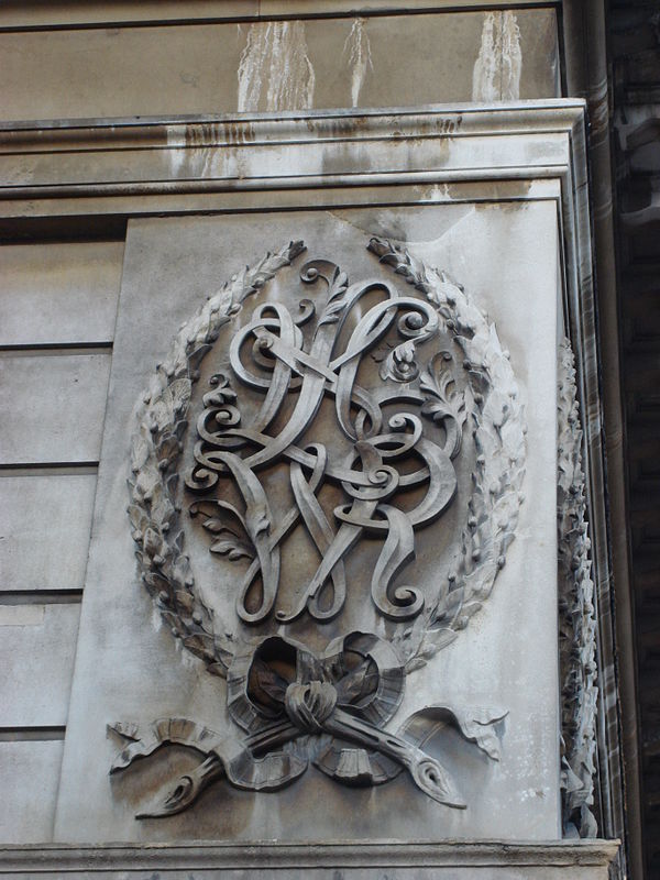 LNWR's initials carved in Portland Stone on one of Euston Station's entrance lodges