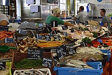 La poissonnière + fishmonger in France.jpg