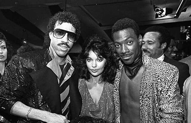 Lionel Richie, Apollonia Kotero and Murphy at the Purple Rain premiere in 1984