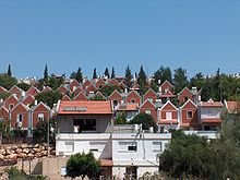 A neighbourhood in the settlement Ariel MaaleAdummim red-roof.JPG