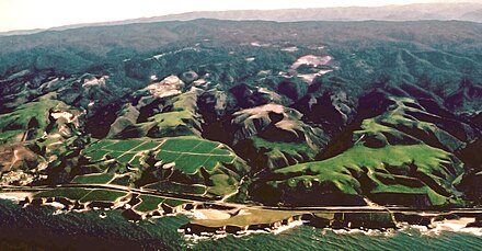 Air photograph of the marine terraced coastline north of Santa Cruz, California, note Highway 1 running along the coast along the lower terraces