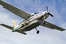 A Cessna 208 of Maya Island Air at Dangriga Airport (2014) Maya Island Air Cessna 208 at Dangriga Airport.jpg