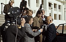 McMahon confronted by reporters in 1972 McMahon and Reporters (2).jpg