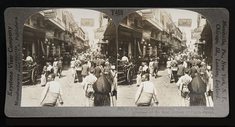 File:Mingling of Orient and Occident -- the Muski, Liveliest of the Real Streets of Cairo, Egypt (9866 T A ) (1908) - front - TIMEA.jpg