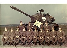 Men and M47 Patton of 63d Tank Battalion, West Germany. My Dad In Germany- He's the one holding the corner of the flag.jpg