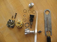 Early Cox Golden Bee disassembled. (Note that the crankcase has been user modified.) Old Cox Babe Bee engine dissasembled.JPG