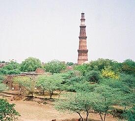 A Panoramic View of Qutub Minar from old Metcalfe house(Dilkhusha) with Guest House in the foreground on the left