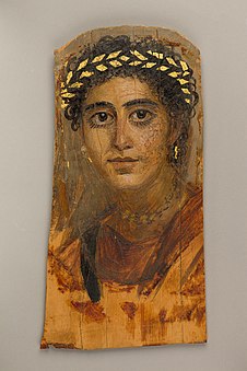 Portrait of a young woman in red; c. 90–120 ; encaustic painting on limewood with gold leaf; height: 38 cm (15 in); Metropolitan Museum of Art (New York City)