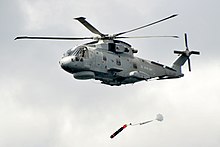 A Merlin HM2 aircraft of 824 NAS. Royal Navy Merlin Helicopter Launching a Training Torpedo MOD 45157953.jpg