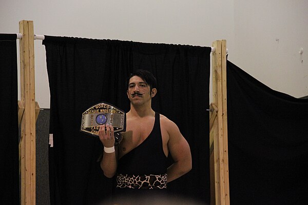 Ryan Drago as the WLW Tag Team Champion