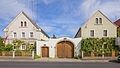 Residential stable house, side building, barn, courtyard wall and archway of a three-sided courtyard