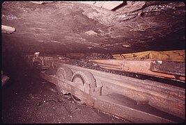 SHUTTLE CAR OF COAL IN A THREE FOOT SHAFT IN A MINE OWNED BY THE TENNESSEE CONSOLIDATED COAL COMPANY NEAR JASPER AND... - NARA - 556510.jpg