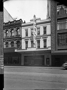 "For My Woman" was recorded at the 2UW Theatre in Sydney. SLNSW 12830 George Street facade Globe World Theatrette.jpg