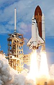 Space Shuttle Discovery lifting off