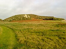 The cist was found on the slopes of Samson Hill in southern Bryher. Samson Hill, Bryher - geograph.org.uk - 2172450.jpg