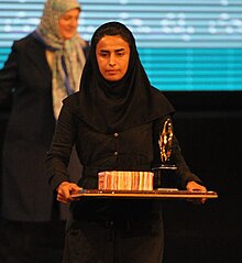 Sara Ghomi, receiving the award of top goalscorer.jpg