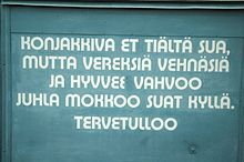 A sign in Savonian dialect: You don't get cognac here, but fresh wheat buns and good strong Juhla Mokka-brand coffee you will have. Welcome.