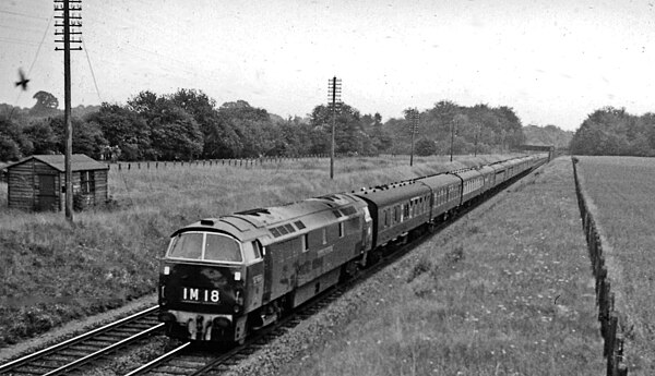 Class 52 hauling an express from Paddington to Birkenhead Woodside near Seer Green in 1962