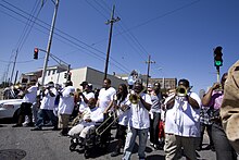 Hot 8 Brass Band (pictured) recorded a cover rendition of the song and met with a positive reaction Single Ladies Second Line Hot 8 Brass Band 4.jpg