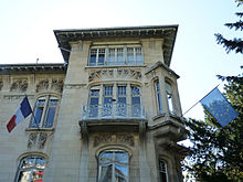 The flag of Europe flown alongside the Flag of France on Villa Schutzenberger, seat of the European Audiovisual Observatory, an institution within the Council of Europe (2011 photograph) Strasbourg-76 allee de la Robertsau (3).jpg