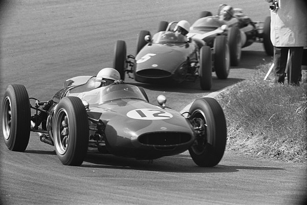 John Surtees (no. 12) replaced Tony Brooks (no. 5) at Reg Parnell Racing.