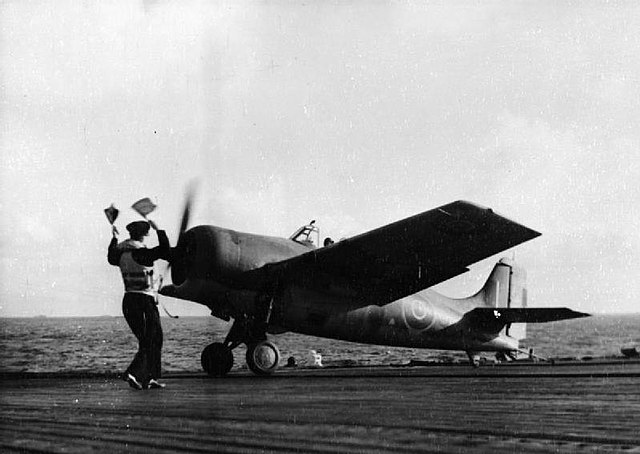 A Grumman Martlet fighter of 811 Squadron lands on HMS Biter after a successful action against a German Junkers Ju 290, February 1944