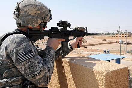 US Army soldier on the roof of an Iraqi police station in Haqlaniyah, July 2011