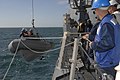 133: US Navy 100929-N-2855B-048 Sailors lower a rigid-hull inflatable boat into the water during routine training operations.jpg