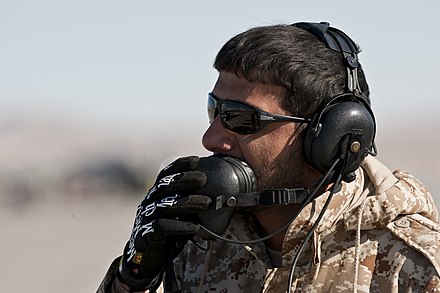UAEAF crew chief communicating during an engine test at Nellis Air Force Base during Red Flag 11–2 on February 2, 2011.