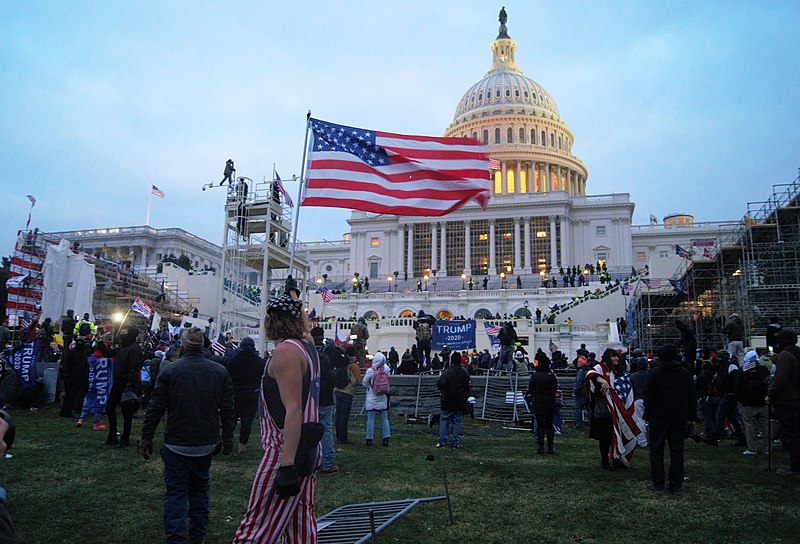 File:United States Capitol outside protesters with US flag 20210106.jpg