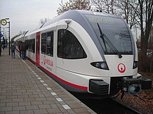 A Veolia train in the Netherlands. Veolia has expanded rapidly based on winning many PSO contracts for bus and rail services in Europe. Veolia GTW front.JPG